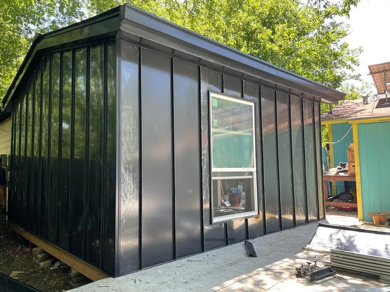 Black standing seam metal wall panels for Metal Roof Installation in Groton